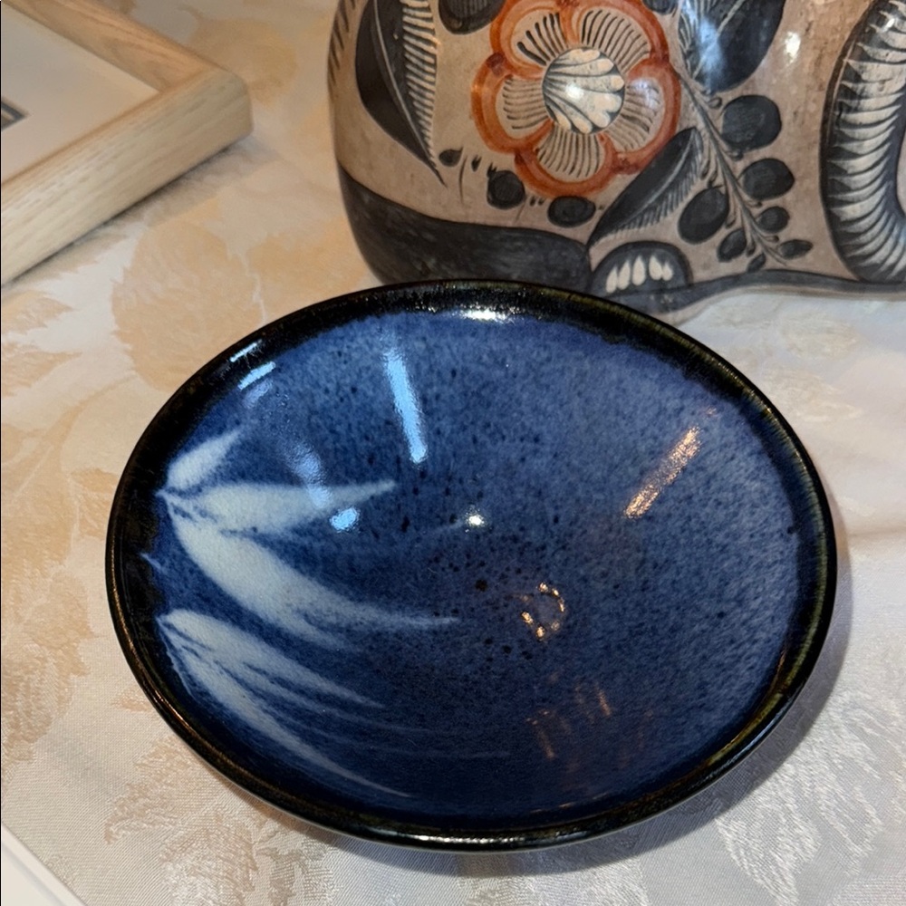 Blue Pottery Bowl with Leaf Design signed by Artist “Parker”